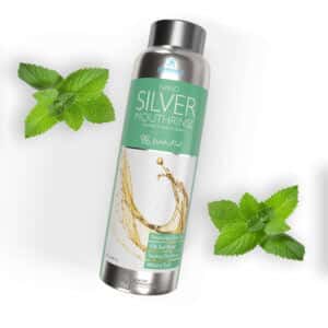 Elementa Silver mouth rinse in wintermint flavor with mint leaves in the background