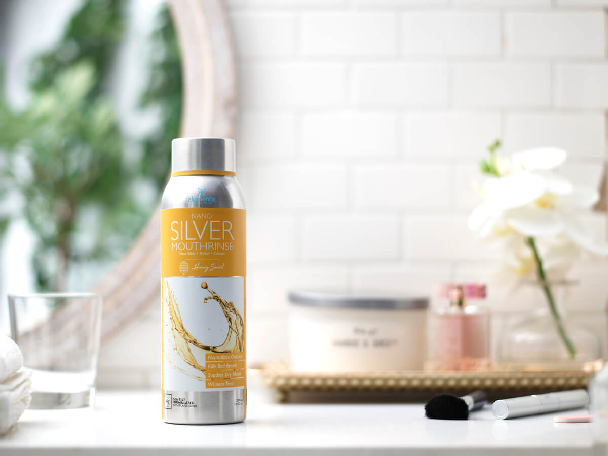image of nano silver honey sweet mouthwash bottle on bathroom counter